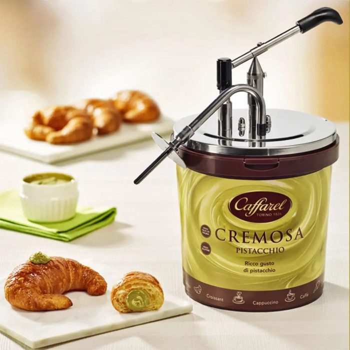 CREMOSA PISTACCHIO CAFFAREL - CREMA SPALMABILE 5 KG. | Caffarel | Certificazioni: senza glutine; Confezione: secchiello da 5 kg. CREMOSA PISTACCHIO CAFFAREL - CREMA SPALMABILE 5 KG. | Caffarel | Certificazioni: senza glutine; Confezione: secchiello da 5 kg.